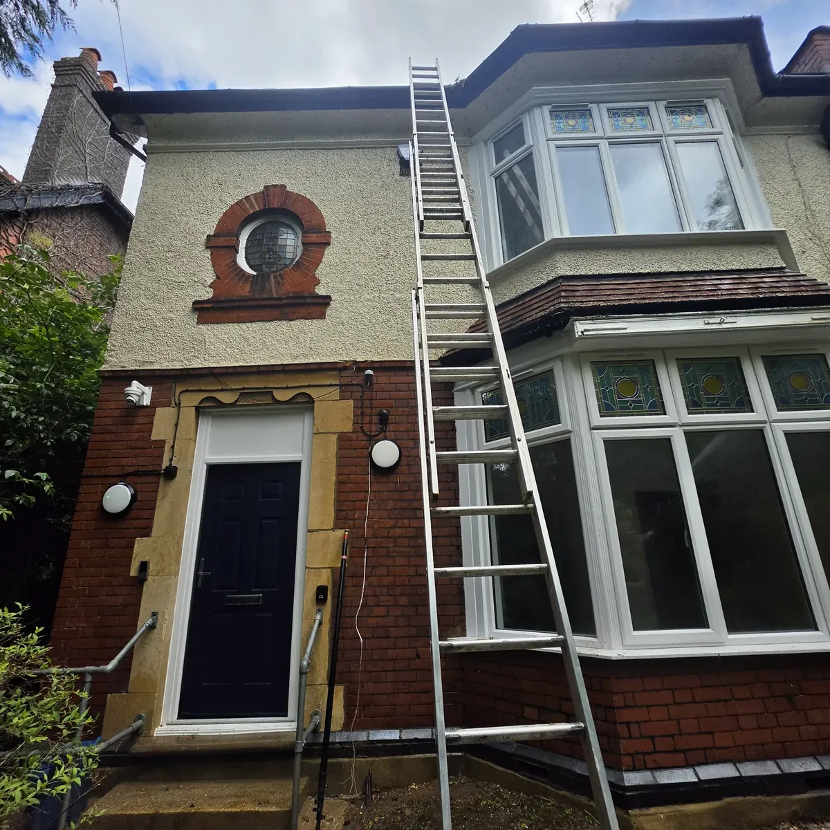 Large Luton (LU1) home being cleaned by ECS - ladder access to the roof, gutters and brickwork