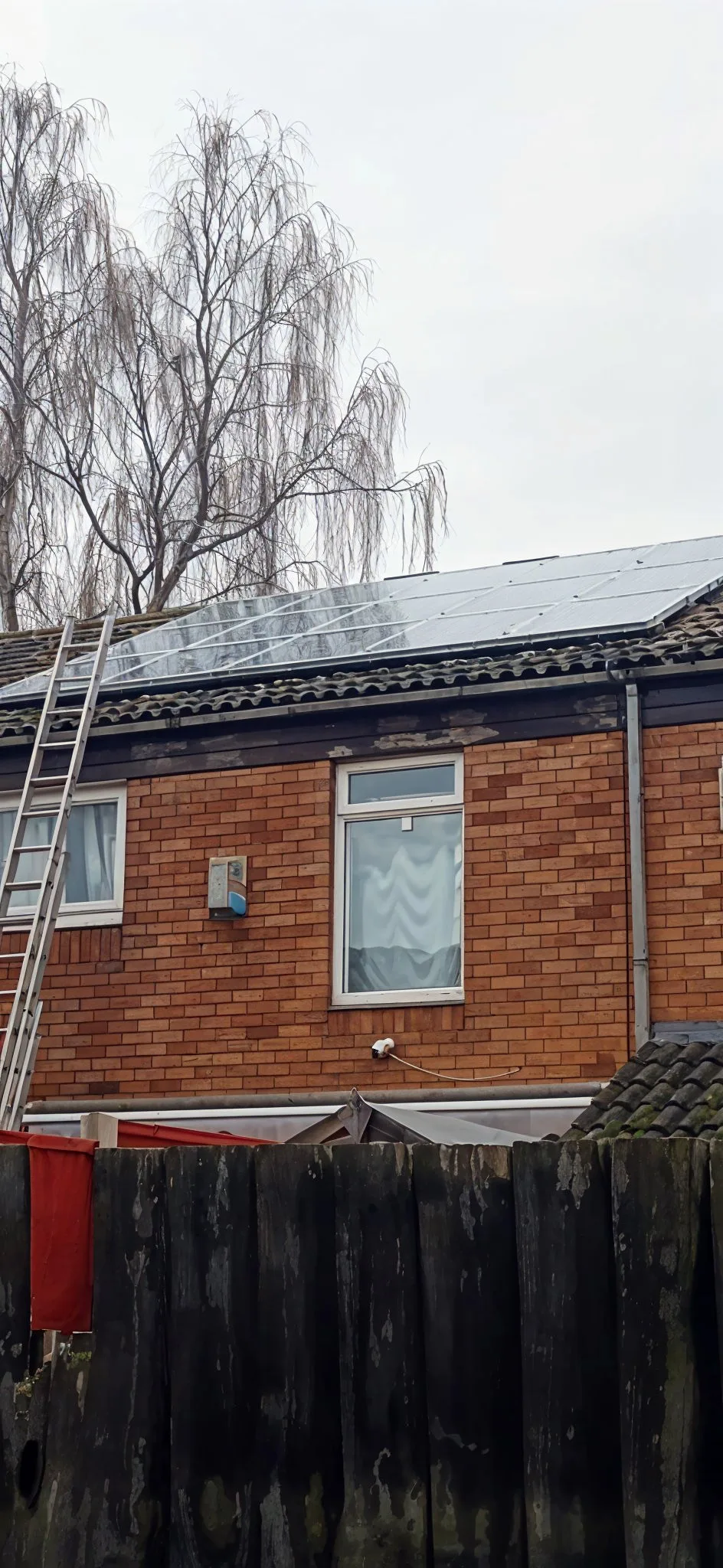 Solar panel cleaning on residential two storey house - pure water system, Northampton