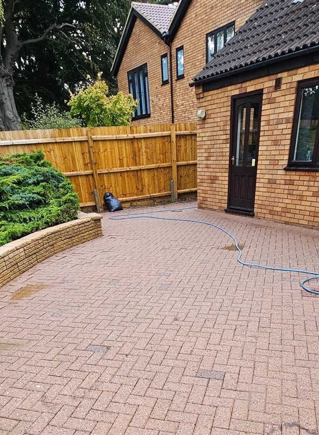 Freshly power washed patio and fence