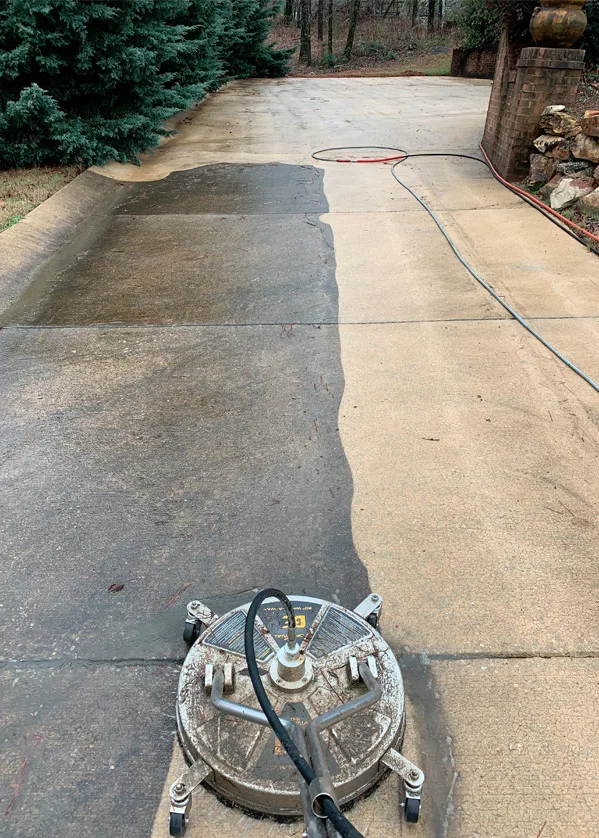 Rotary pressure washing machine cleaning concrete patio