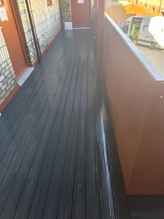 residential development buff brick courtyard boom lift access