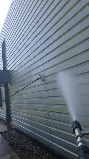 commercial industrial unit profiled metal cladding steam cleaned atmospheric grime