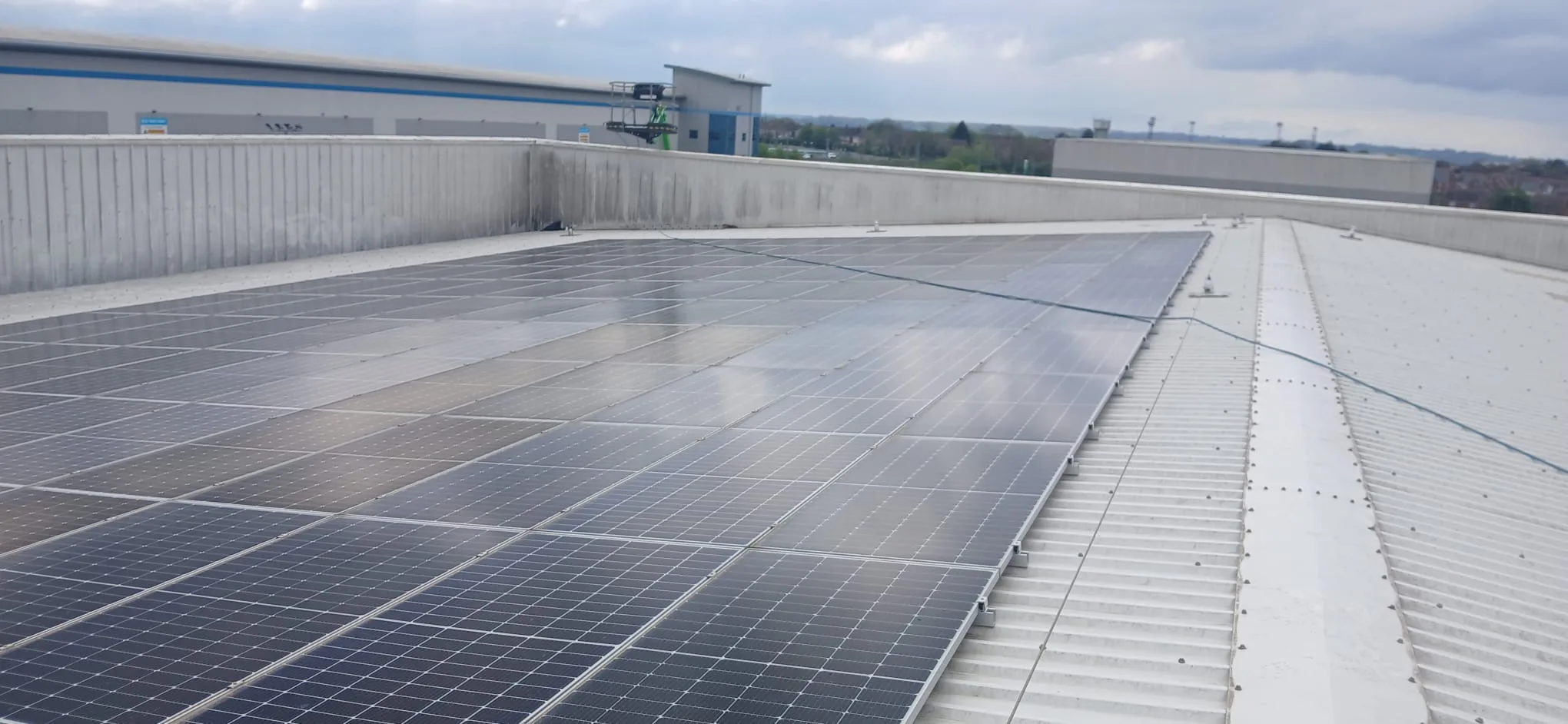 Solar panels on Partridges warehouse roof after cleaning - Desborough industrial estate