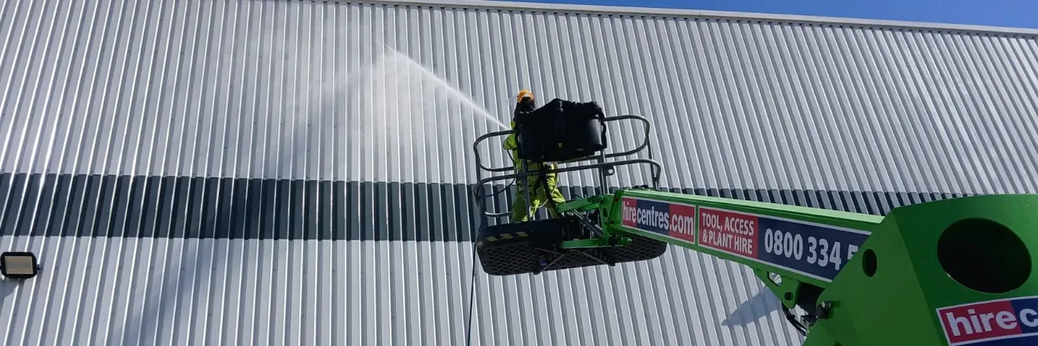 Commercial warehouse after exterior cleaning - clean cladding and roof, Desborough industrial estate
