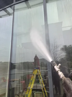 During - commercial venue large glazing panels atmospheric grime water fed pole clean, Birmingham.
