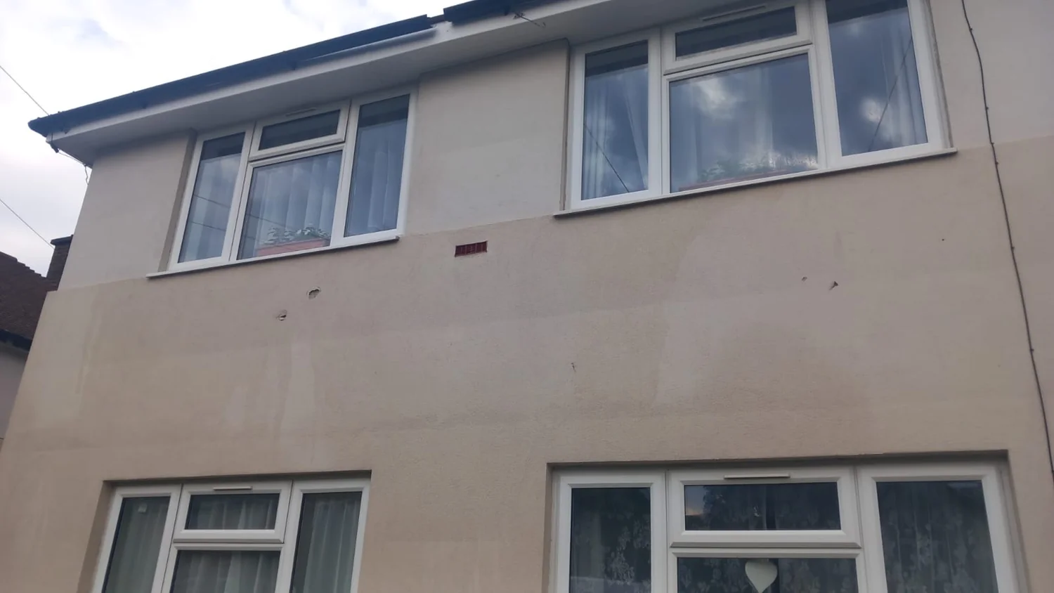 Council housing render cleaning - multi-storey residential block after soft wash treatment