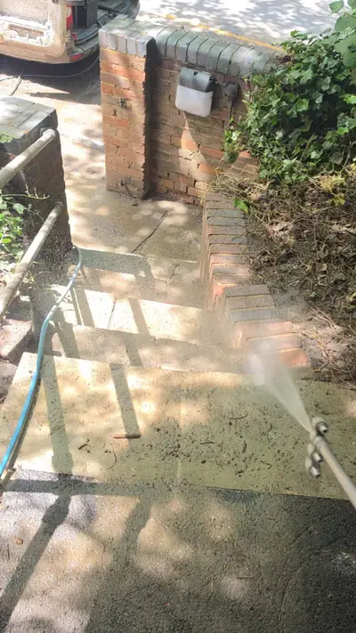 Softwash solution applied to the patio and step slabs during cleaning - Luton
