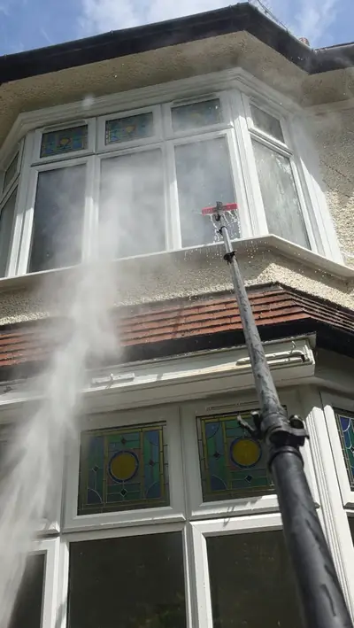 Exterior windows being cleaned on a Luton property