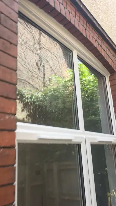 Cleaned windows and surrounding brickwork on a Luton property - wide after view