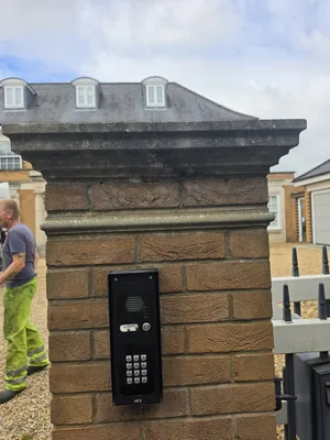 Before - residential brick boundary wall heavy algae lichen staining, Orlingbury.
