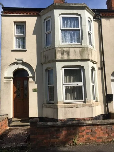 residential victorian house render algae black streaking bay window