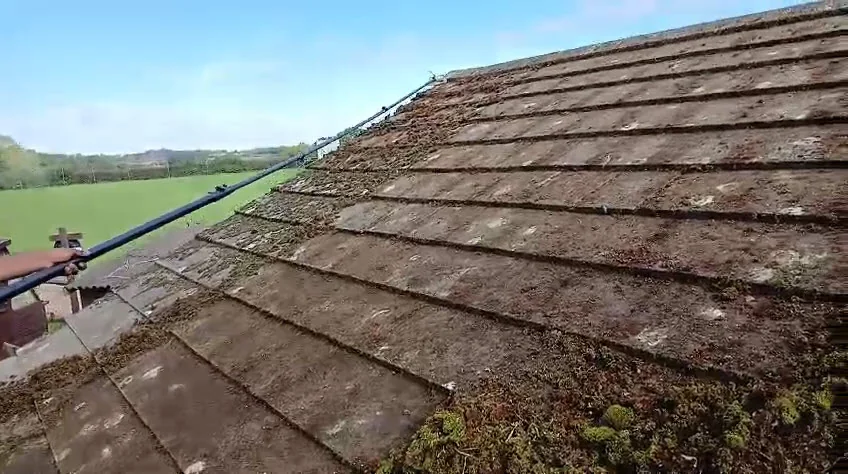 Residential concrete tile roof in Northampton after heavy moss removal, October 2024