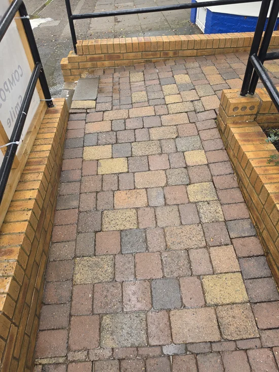 Before - commercial surgery entrance block paving moss weed biological growth, Northampton.